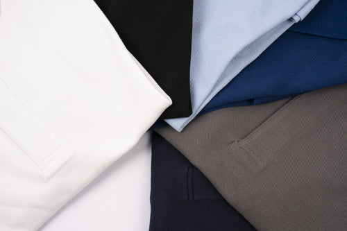 Polo botón oculto manga corta